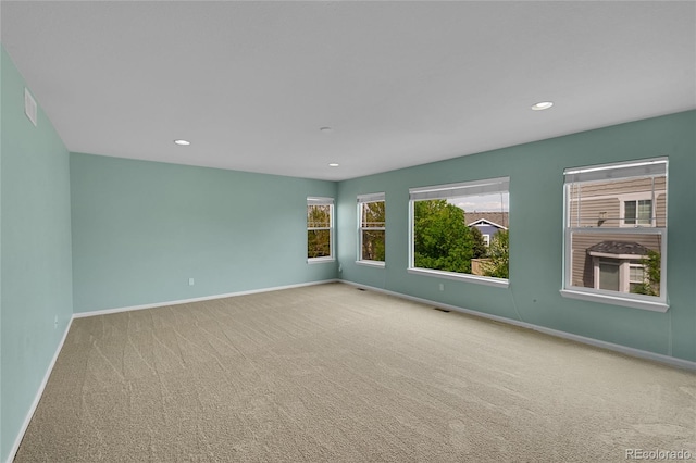 3590 S Malaya St, Aurora, CO 80013 - spare room with carpet, baseboards, and recessed lighting