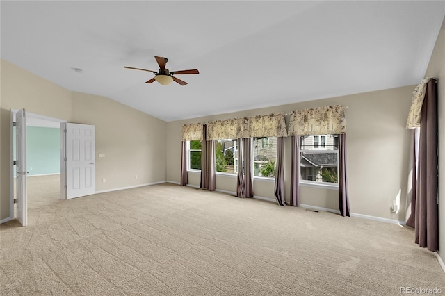 3590 S Malaya St, Aurora, CO 80013 - empty room featuring lofted ceiling, baseboards, light carpet, and a ceiling fan