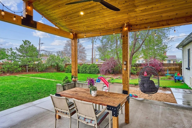 view of patio featuring a ceiling fan and outdoor dining space