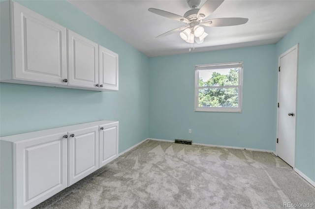 8696 E Easter Ave, Centennial, CO 80112 - spare room with ceiling fan and light carpet