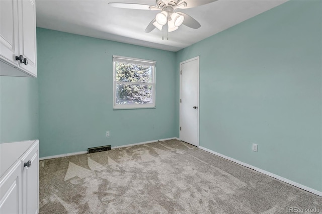 8696 E Easter Ave, Centennial, CO 80112 - empty room with ceiling fan and carpet flooring
