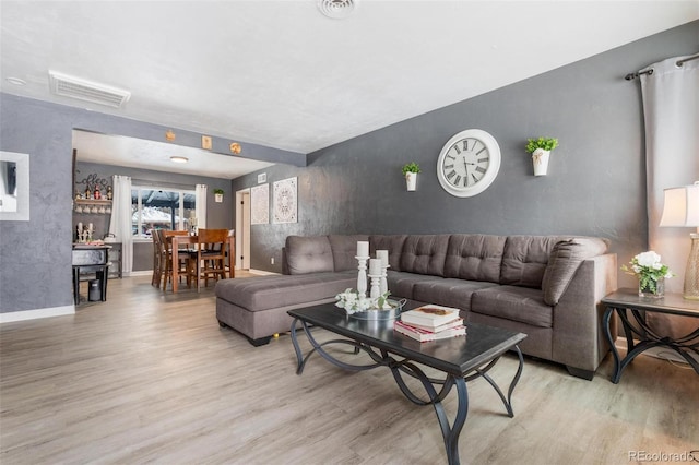 living room with light wood-type flooring