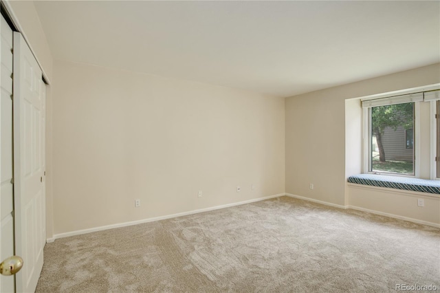 view of carpeted spare room