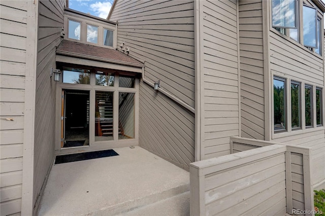 property entrance with a patio