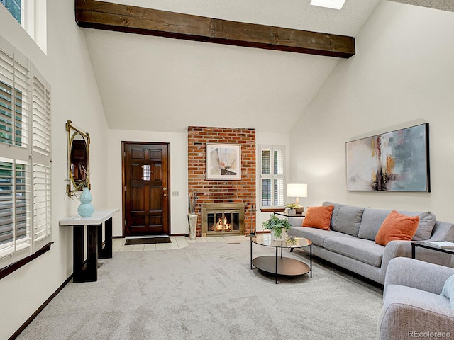7781 S Curtice Dr Unit D, Littleton, CO 80120 - living area featuring high vaulted ceiling, a brick fireplace, carpet floors, plenty of natural light, and beam ceiling