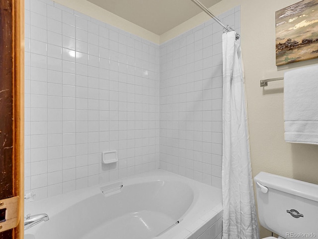 7781 S Curtice Dr Unit D, Littleton, CO 80120 - full bathroom featuring shower / bath combo with shower curtain and toilet