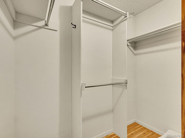 7781 S Curtice Dr Unit D, Littleton, CO 80120 - spacious closet featuring light wood-type flooring