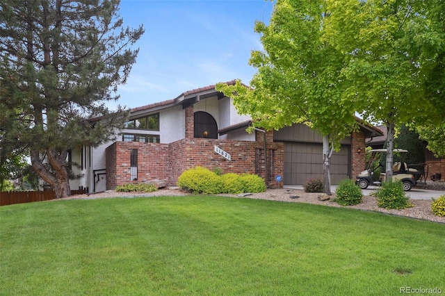 11621 Shoshone Way, Denver, CO 80234 - view of front of home featuring an attached garage, stucco siding, and a tiled roof