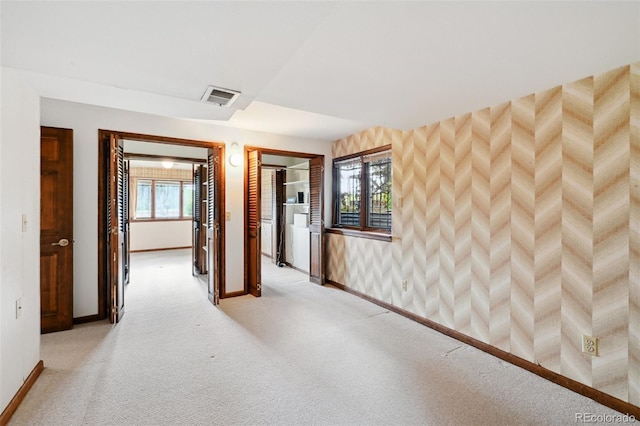 11621 Shoshone Way, Denver, CO 80234 - corridor with light carpet and baseboards
