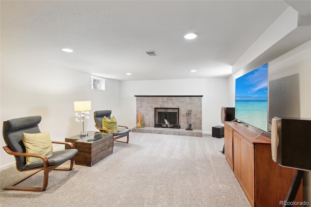 6188 S Westview St, Littleton, CO 80120 - living area featuring carpet flooring, recessed lighting, visible vents, and a fireplace with raised hearth