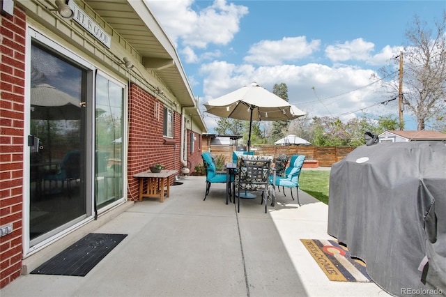 6188 S Westview St, Littleton, CO 80120 - view of patio with fence and outdoor dining space