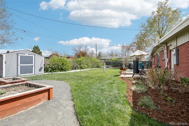 6188 S Westview St, Littleton, CO 80120 - view of yard featuring a storage shed, a patio, and an outdoor structure