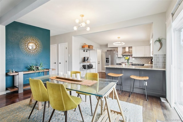 6188 S Westview St, Littleton, CO 80120 - dining space featuring a notable chandelier and wood finished floors