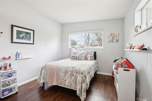 6188 S Westview St, Littleton, CO 80120 - bedroom featuring baseboards and wood finished floors