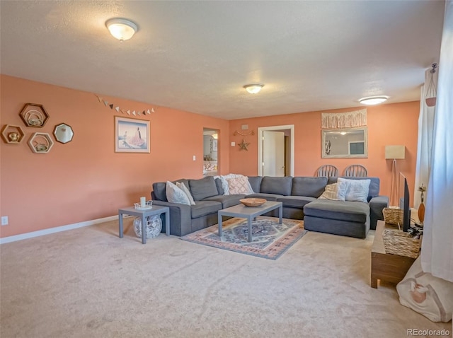 living room featuring light carpet and a textured ceiling