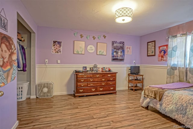 bedroom with light wood-type flooring