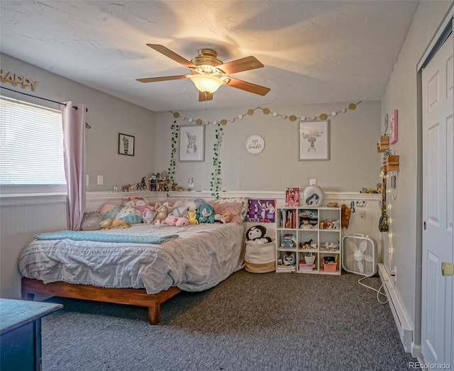 bedroom with carpet flooring, a closet, and ceiling fan