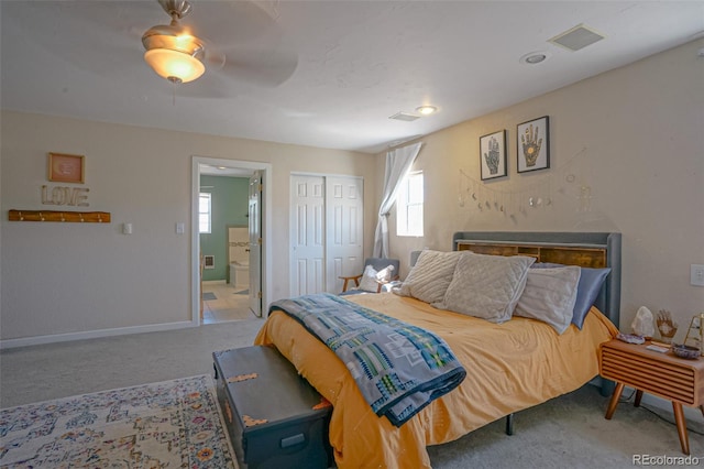 carpeted bedroom featuring ensuite bathroom and ceiling fan