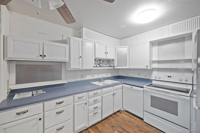 350 S Clinton St Unit 8C, Denver, CO 80247 - kitchen featuring white appliances, ceiling fan, white cabinetry, and backsplash