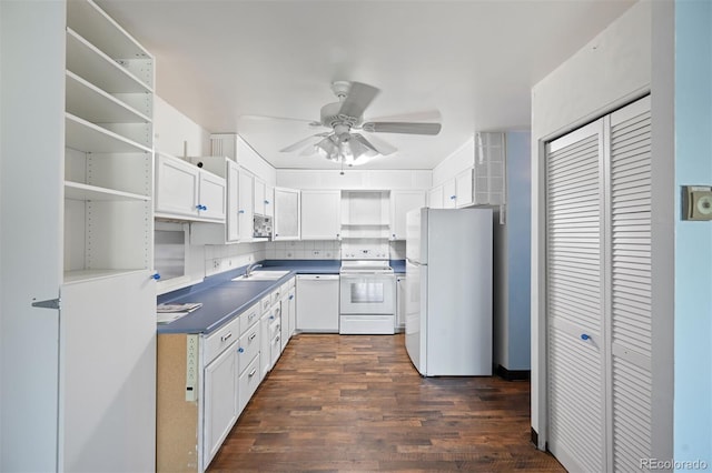 350 S Clinton St Unit 8C, Denver, CO 80247 - kitchen with white appliances, ceiling fan, dark countertops, dark wood finished floors, and open shelves