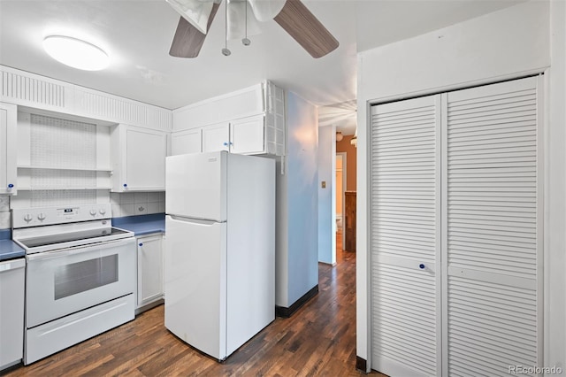 350 S Clinton St Unit 8C, Denver, CO 80247 - kitchen with white appliances, dark wood-style flooring, white cabinetry, and a ceiling fan