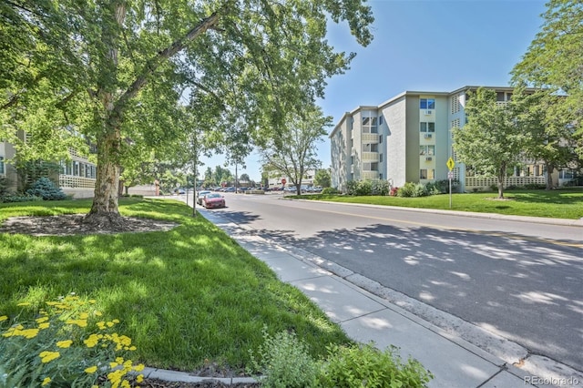 350 S Clinton St Unit 8C, Denver, CO 80247 - view of asphalt road featuring curbs and sidewalks