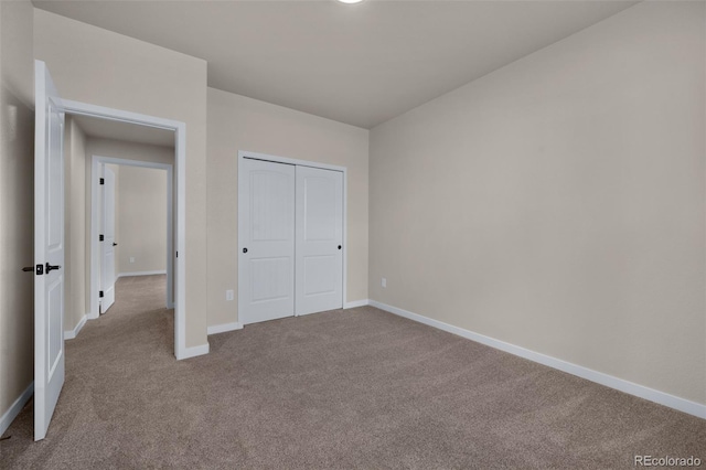 16990 Early Light Dr, Colorado Springs, CO 80908 - unfurnished bedroom featuring baseboards, carpet, and a closet