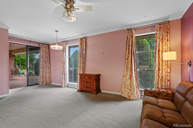 2800 S University Blvd Unit 1, Denver, CO 80210 - carpeted living area with crown molding, healthy amount of natural light, and a ceiling fan