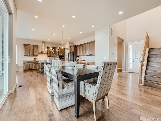 dining room featuring light hardwood / wood-style flooring