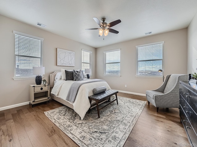 bedroom featuring ceiling fan and wood-type flooring