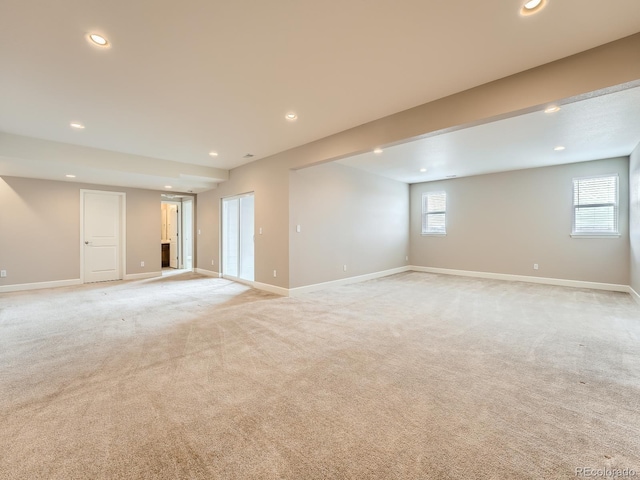 interior space featuring light carpet