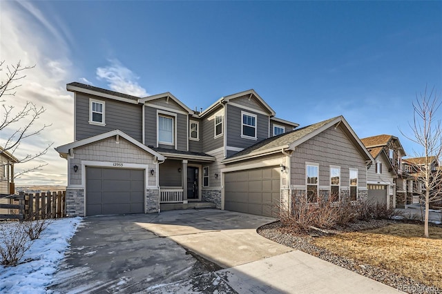 craftsman inspired home with a garage