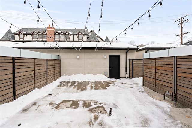 view of yard layered in snow