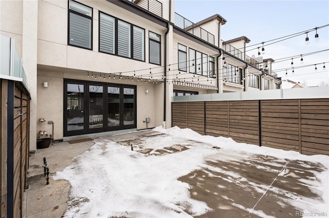 view of snow covered patio