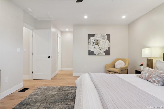 bedroom with light hardwood / wood-style floors