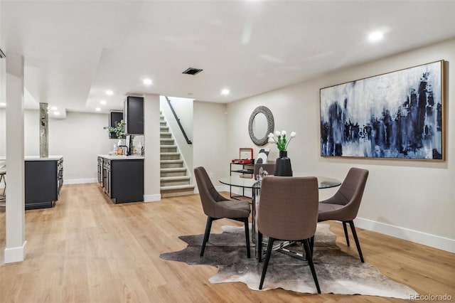 dining room featuring light hardwood / wood-style floors