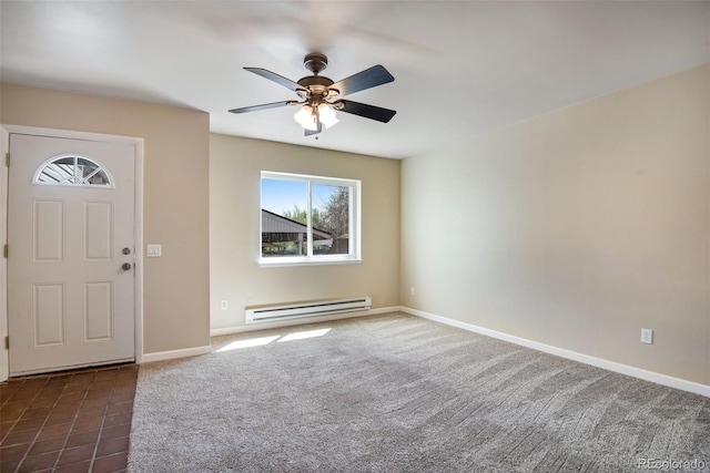 foyer entrance with ceiling fan, a baseboard heating unit, baseboards, and dark carpet