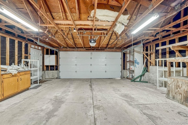 garage featuring a garage door opener