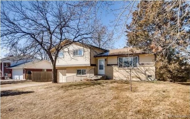 10951 Acoma St, Northglenn, CO 80234 - view of front of house featuring an attached garage