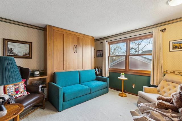 2013 S Holland St, Lakewood, CO 80227 - living room featuring carpet flooring, wallpapered walls, and a textured ceiling