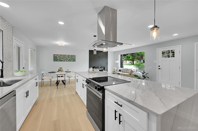 6526 S Elmwood St, Littleton, CO 80120 - kitchen with electric range oven, stainless steel dishwasher, island exhaust hood, a sink, and light wood-style flooring