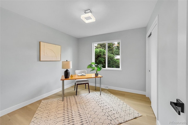 6526 S Elmwood St, Littleton, CO 80120 - office space with baseboards and light wood-type flooring