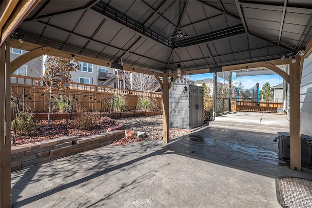 view of patio with a gazebo and central AC unit