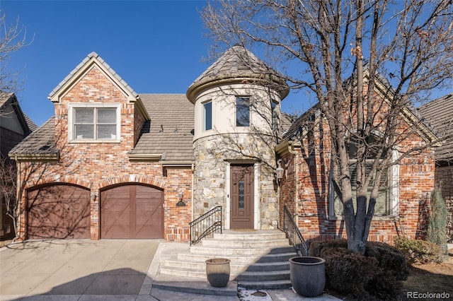 view of front of property with a garage