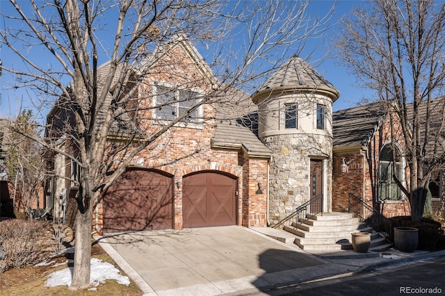 view of front of home with a garage