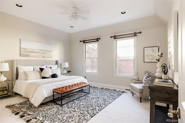 carpeted bedroom featuring ceiling fan