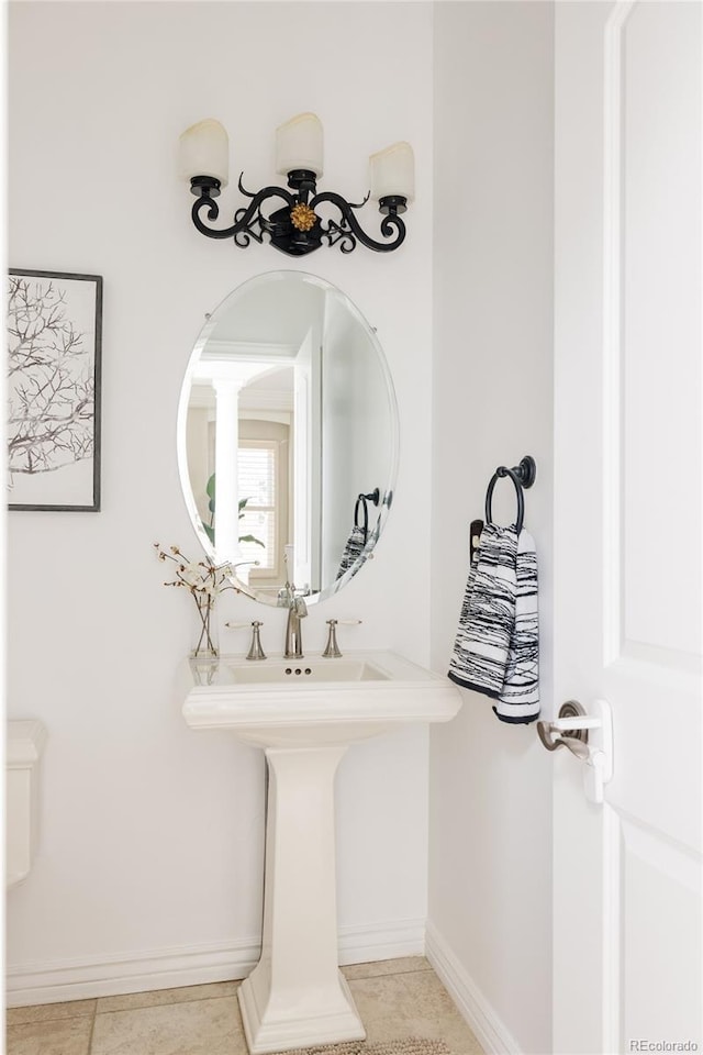 bathroom with sink and tile patterned floors