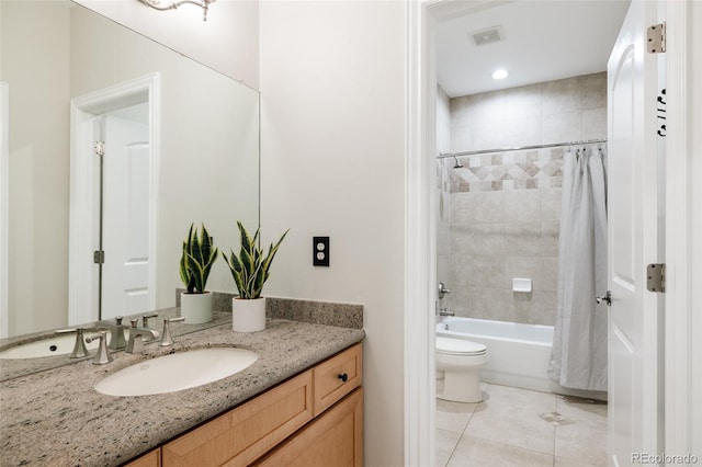 full bathroom with toilet, vanity, shower / tub combo, and tile patterned flooring