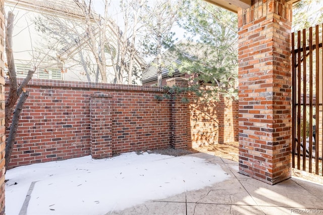 view of snow covered patio