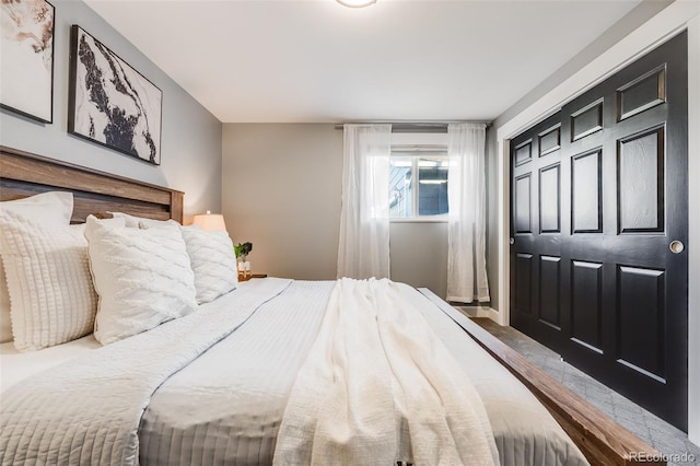 bedroom featuring wood finished floors